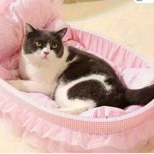 Cozy Pink and White Cat Bed